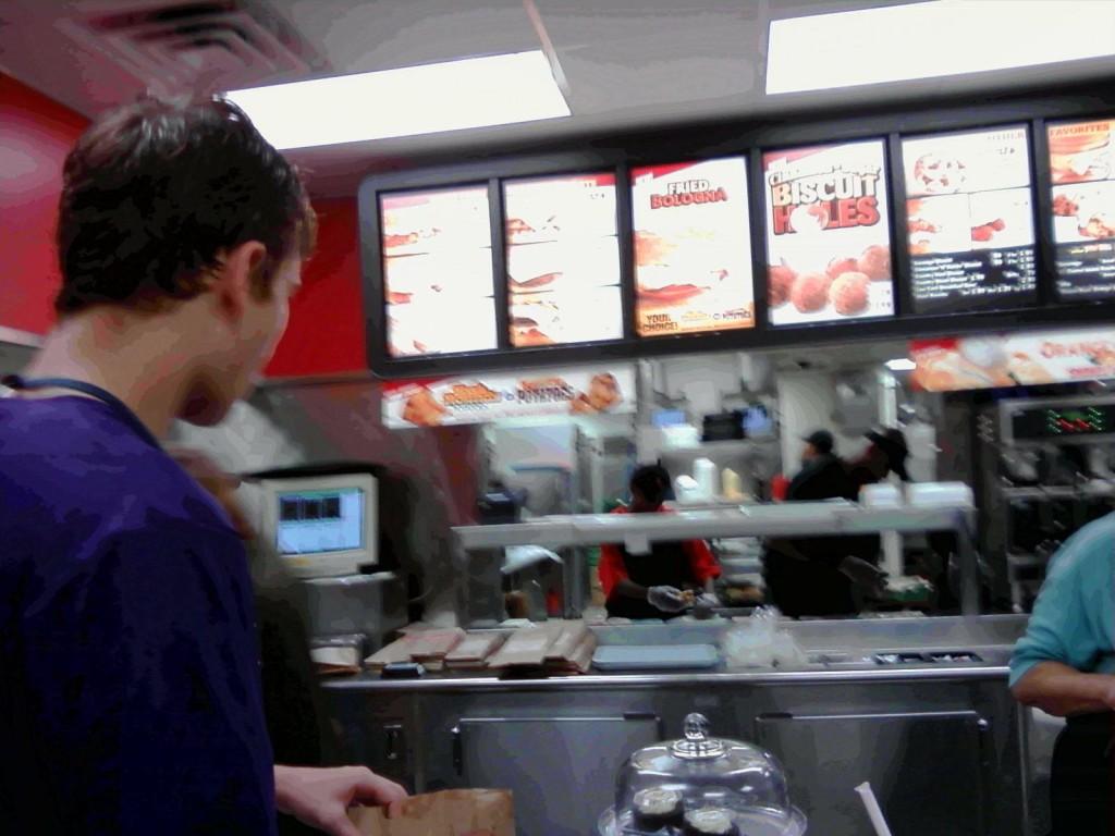 Junior Rion Tapp eyes the early morning Hardee's menu in search of the ultimate breakfast delight.