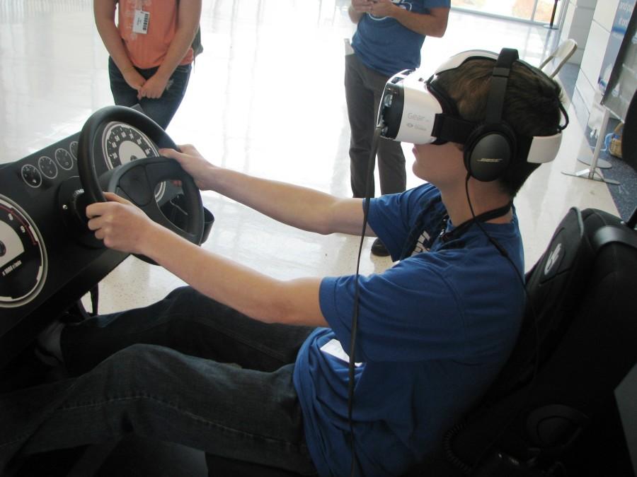 Sophomore Justin Ford takes a drive on the simulator.