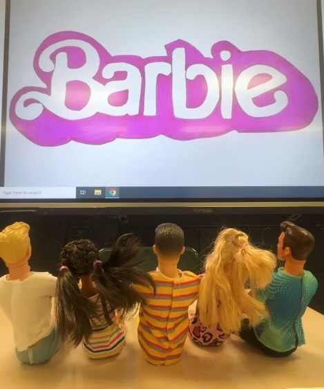 Various Barbie Dolls prepare to watch Barbie!