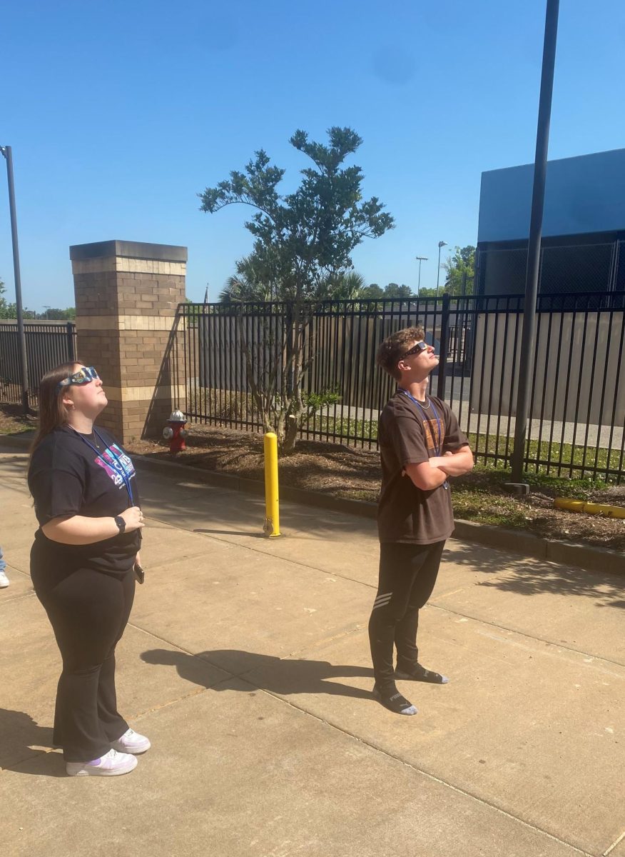 Mia Walsh and Colton Cromer view the eclipse on April 8th