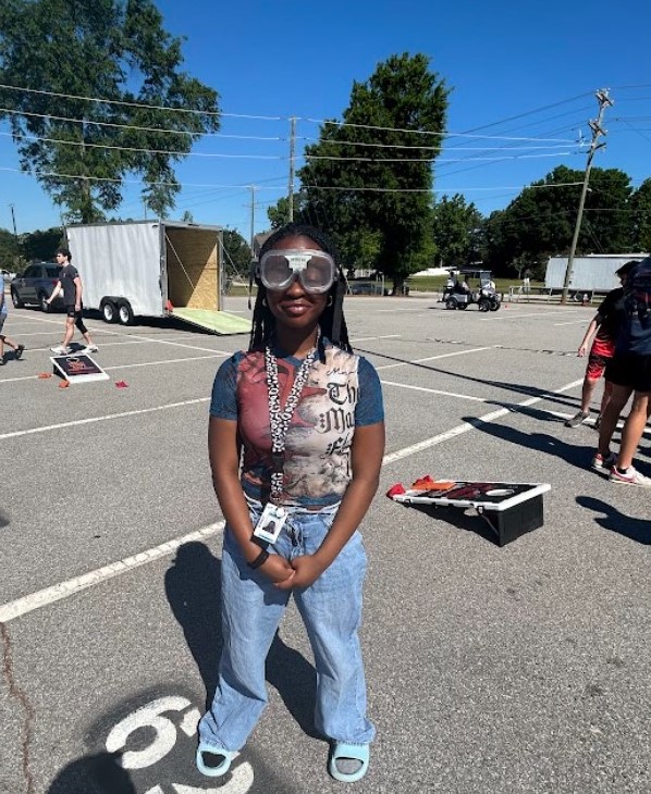 Nyla Gleaton, got a chance to drive the cart. She is wearing googles that distorted her vision.