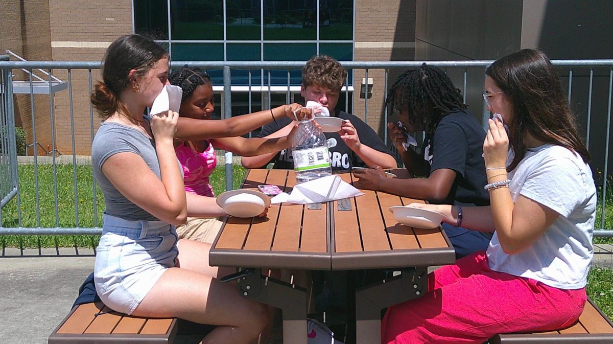 (left to right) Journalism students Ana Filich, Lania Moody, Logan McGuire, Jayden Hagood and Molly McBroom pose for the favorite foods photo.