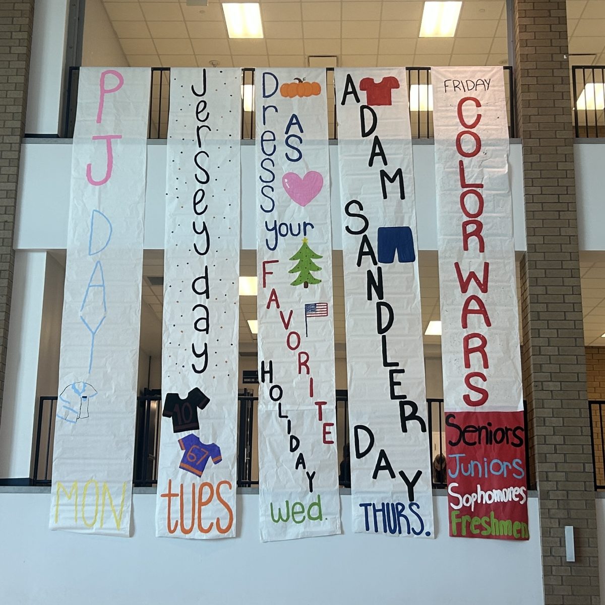 Homecoming spirit week posters.